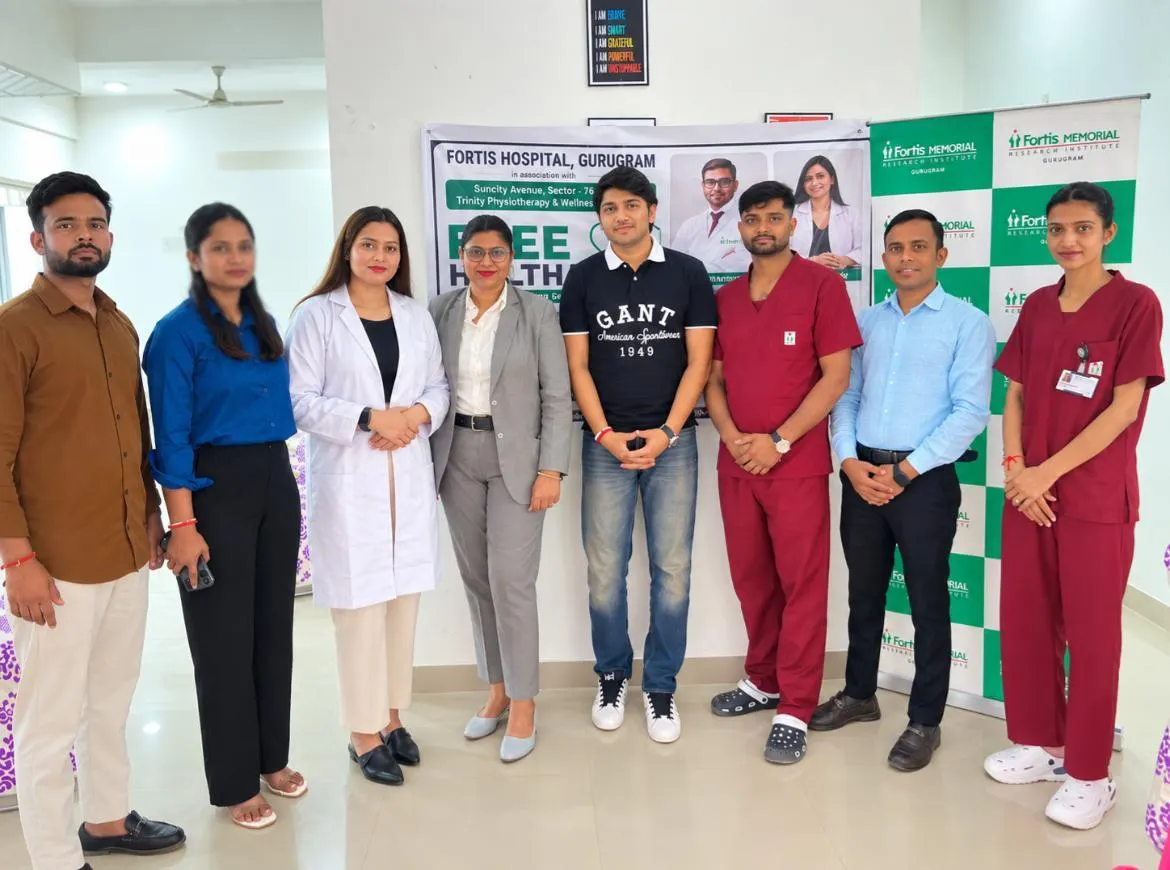 Trinity team with Fortis Hospital doctors at a free health camp
